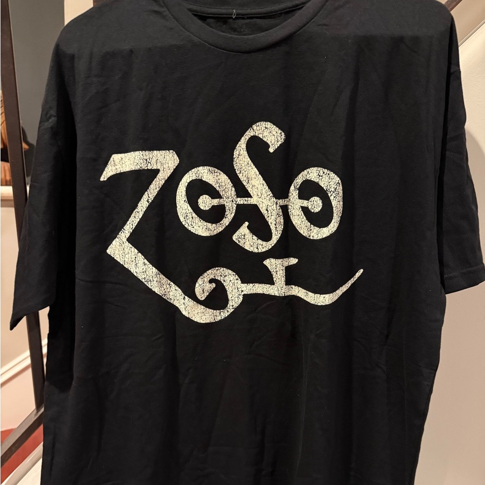The "Zoso" symbol is a symbol created by Jimmy Page of Led Zeppelin. Brand new